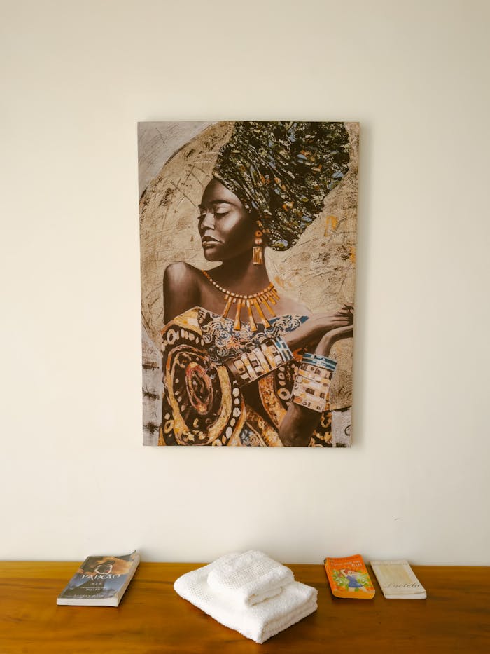 about-us-02 Stylish African-themed wall art enhances this minimalist interior with elegance.